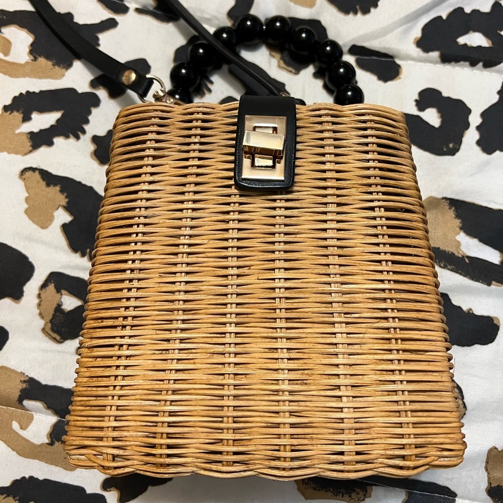 Venus Rattan crossbody with black accents NWOT